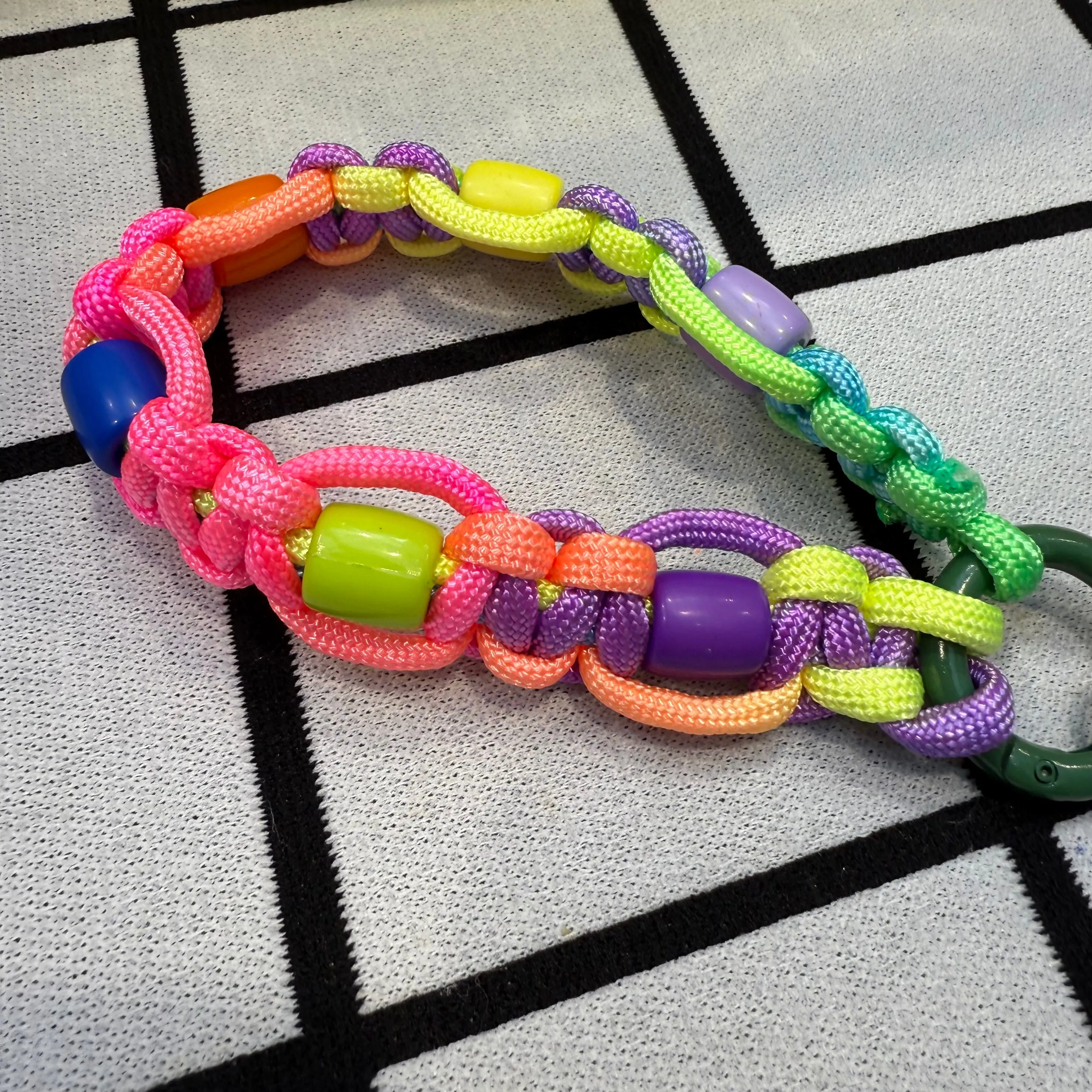 Phone wristler strap with beads